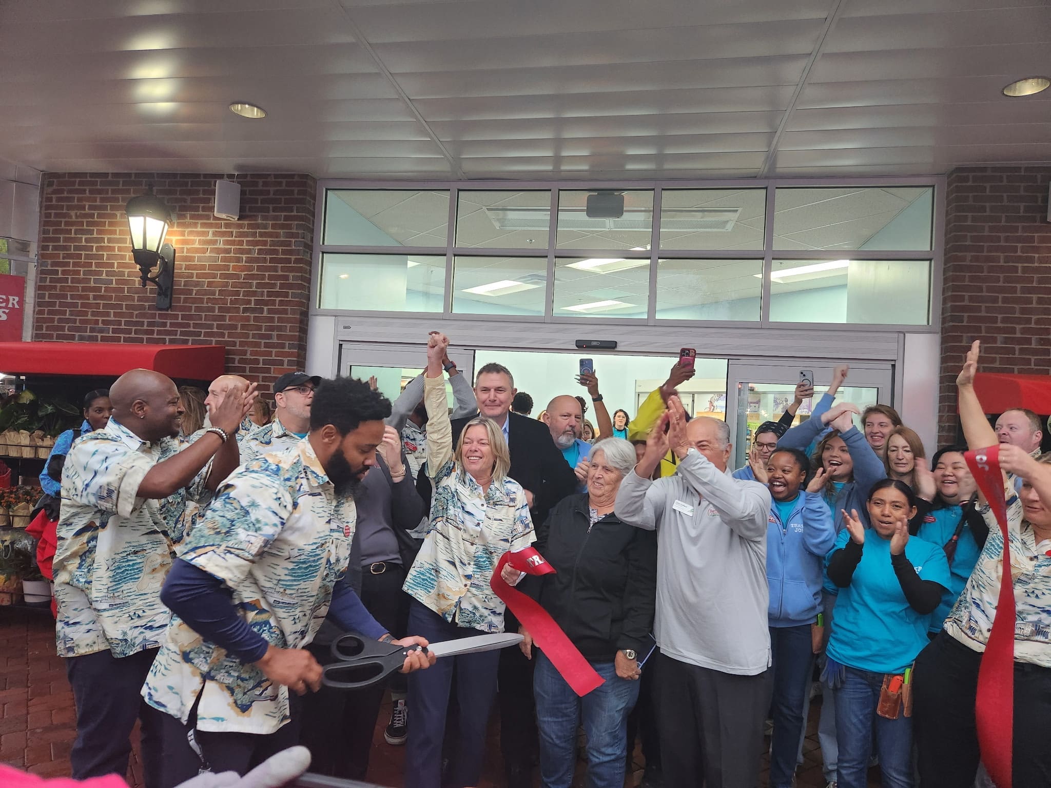 Trader Joe’s Opens to Cheers, Rain, and Record C...