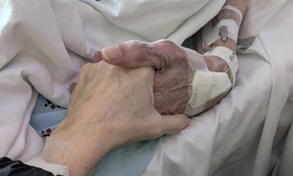 While Melodie Woods Recovered From Cancer Surgery, Her Husband Wesley Died