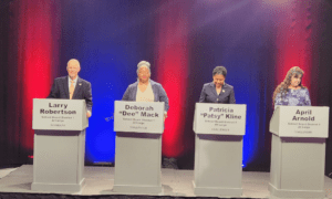 School Board Candidates Clash on Spending, Stand...