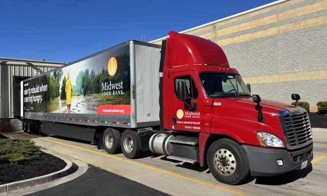 A Midwest Food Bank tractor-trailer parked outside the Midwest Food Bank Georgia warehouse.
