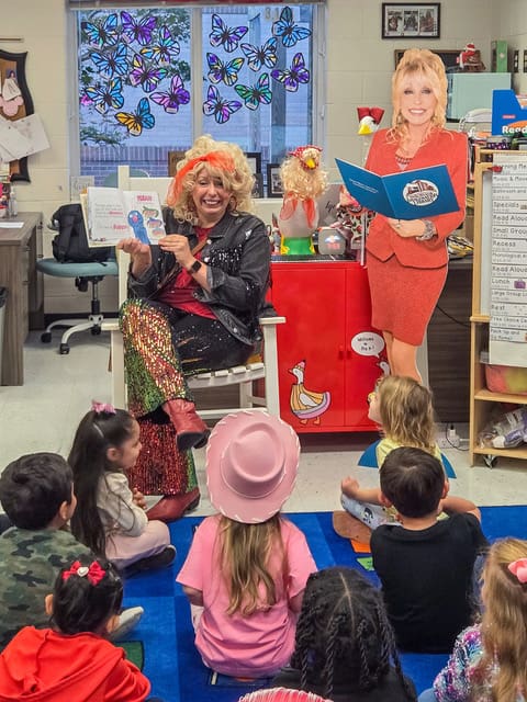 Staff dressed as Dolly Parton read to students on Dolly Day