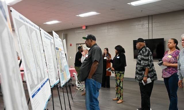 Residents look over map boards at Fayette County's Comprehensive Plan Visioning Fair.