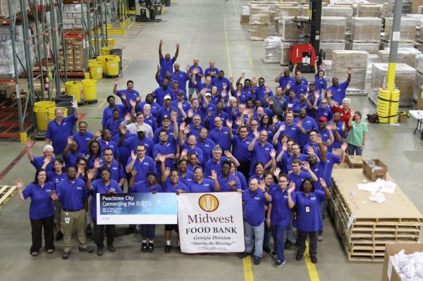 Food bank volunteers process 175,000 items