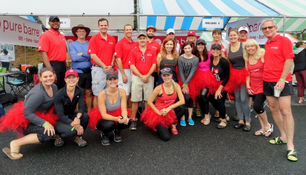 Pure Barre fields winning Dragon Boat team