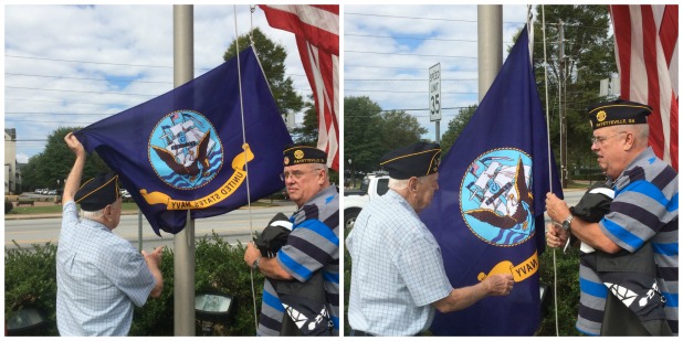 Post 105 raises Navy flag