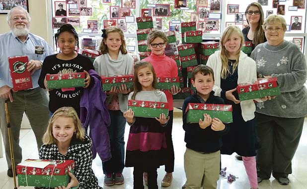 St. Paul members pack and send 150 Christmas box...