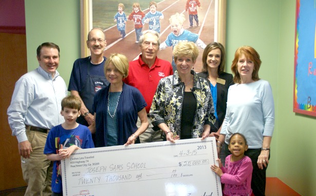 Thrift store gives $20,000 to Joseph Sams School