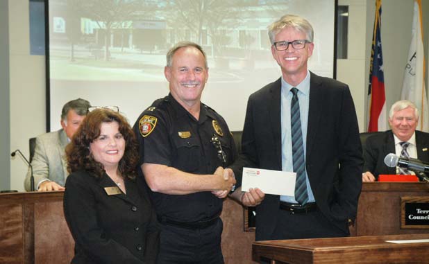 Nissan of Newnan gives $2,000 for PTC police bod...