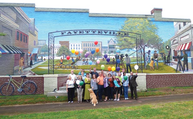 Fayetteville citizens celebrate mural