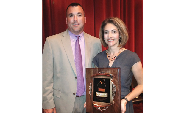 Milam wins Teacher of the Year
