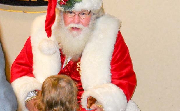 Fayetteville cops serve as Santa for needy children