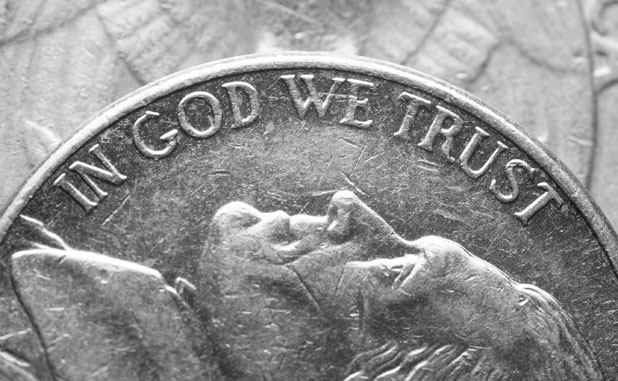 Rousseau gets delay for ‘In God We Trust’